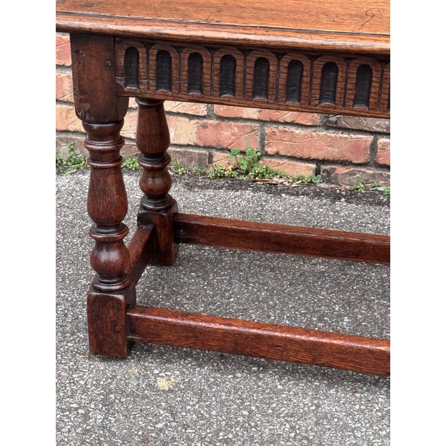 This a lovely English dining bench with amazing millwork detailing on the apron, patina on the wood grain and stylish...