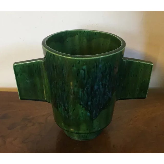 French modernist art pottery vase. Interesting construction and shape with wide handles at each side. Measures 8 3/4" tall...