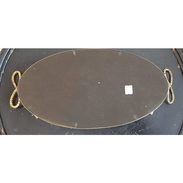 Vintage Vanity Mirror With Metal Rope Bow Tassel design. Very Hollywood Regency in design. Perfect for a vanity or dresser...