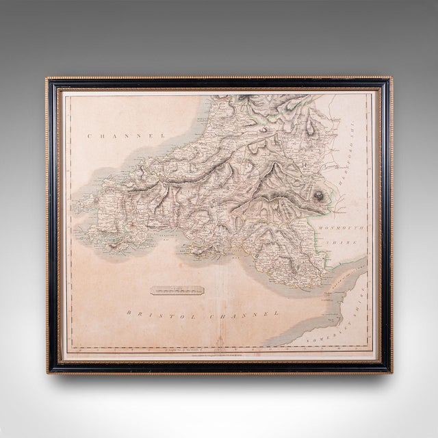 This is an antique region map of South Wales. An English, framed atlas engraving of cartographic interest by John Cary,...