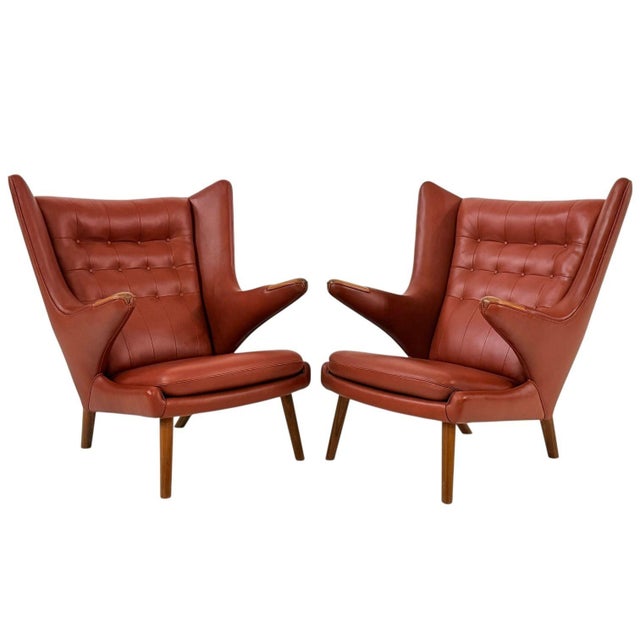 Hans J Wegner PP19 for PP Mobler Papa Bear Chairs, 1980’s. Original leather with teak legs and teak on arms. Measures 40”...