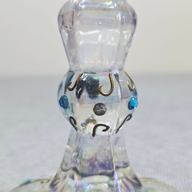 A beautiful pair of antique Bohemian pressed glass candlesticks from the Art Nouveau period, circa 1890s–1910s. Each...
