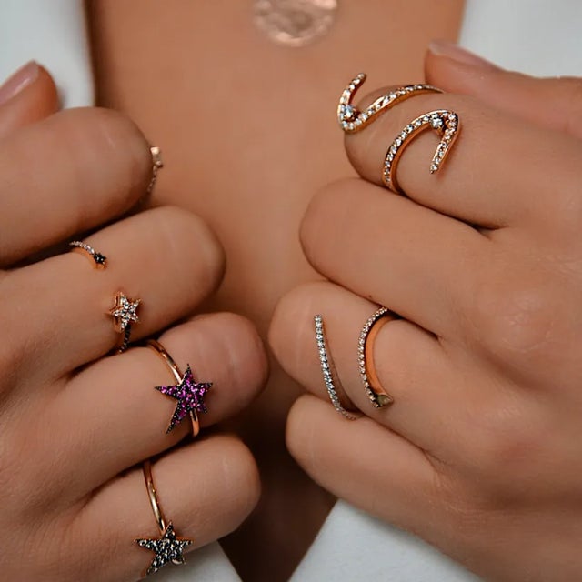 This is part of Chairish’s Fine Jewelry assortment. Have the stars at your fingertips. Shop our 14K Gold and Ruby Rock...