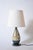 Doe pattern Primavera ceramic lamp, 1930s. Art Deco ceramic lamp decorated with a doe in blue monochrome on a white...