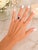 Contemporary 18K White Gold Oval Garnet and Diamond Halo Cocktail Ring For Sale - Image 11 of 11