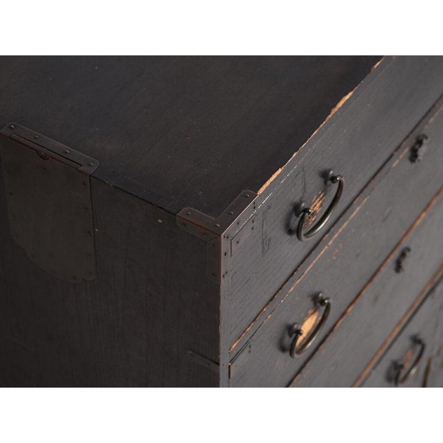 Antique Japanese Isho-Dansu chest crafted from paulownia wood (kiri), dating to the late Meiji to early Taishō period,...