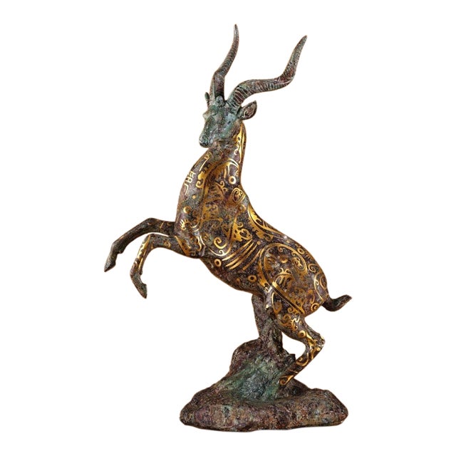 Bronze Leaping Antelope Sculpture, Intricate Gold Inlaid Scroll Patterns, Archaic Chinoiserie Statue For Sale