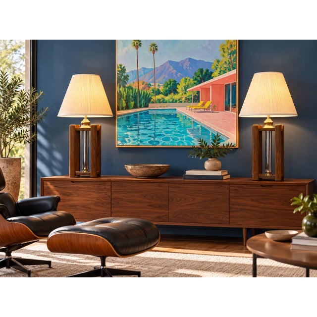 This lamp pair suits interiors that embrace sculptural lighting, Hollywood Regency sparkle, or mid-century stylr. They...