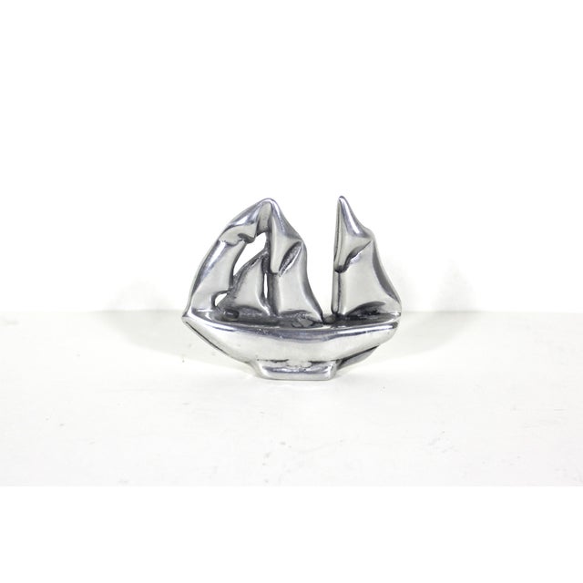 Width: 4 inches Height: 3.25 inches Depth: 1 inches Really great modernist sculpture of a sailboat made by Hoselton,...