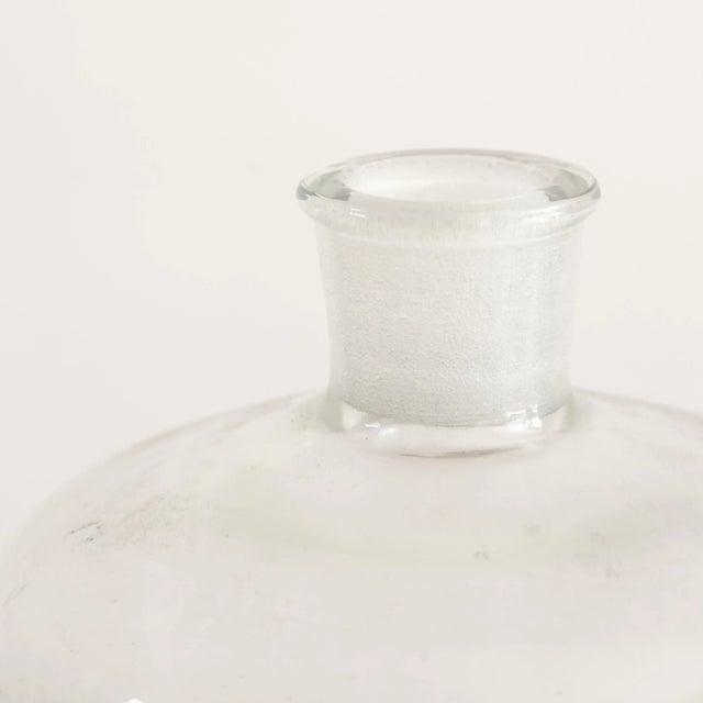 Vintage lab glass narrow neck vessel with flared lip top and dispenser spout.