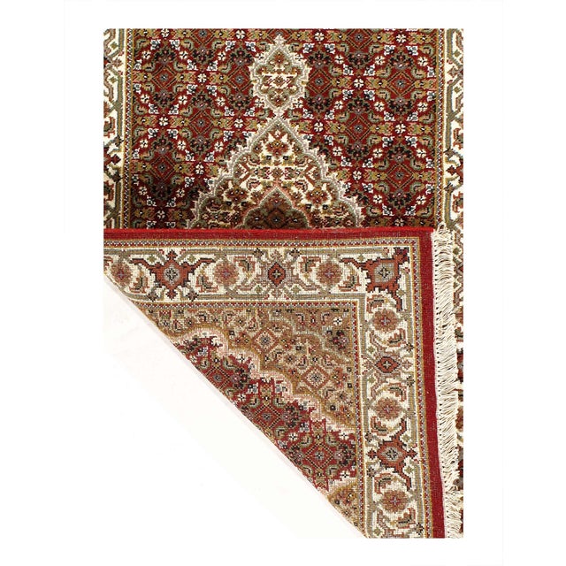This is a hand-knotted TABRIZ Design Rug. Silk & Hand-Spun Wool Rug. All natural Dyed. This rug is handmade from 100%...