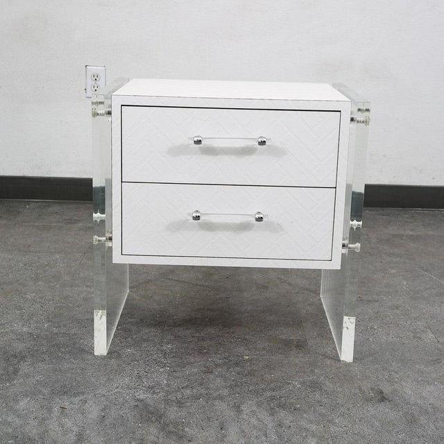 2 drawer lucite and white nightstand. American designed. Heavy piece. unsigned example.