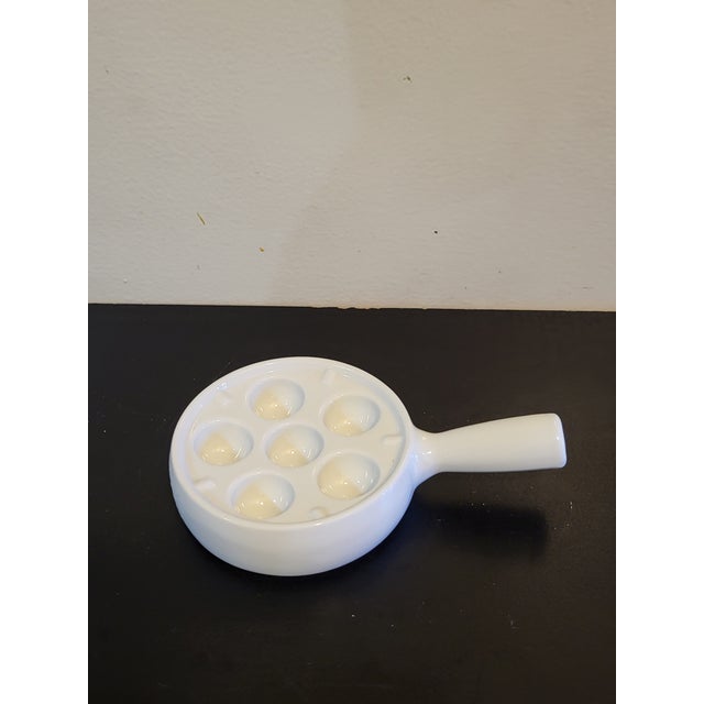 Beautiful vintage escargot or stuffed mushroom pan. Good condition and nice glossy finish. Made in France
