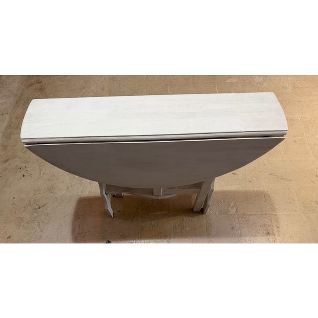 Wood Vintage Whitewashed Drop-Leaf Round Accent Table in the Swedish Country Style For Sale - Image 7 of 8