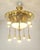 Art Nouveau chandelier in polished brass with an opal glass centerpiece and bronze lion heads. It has been rewired at some...