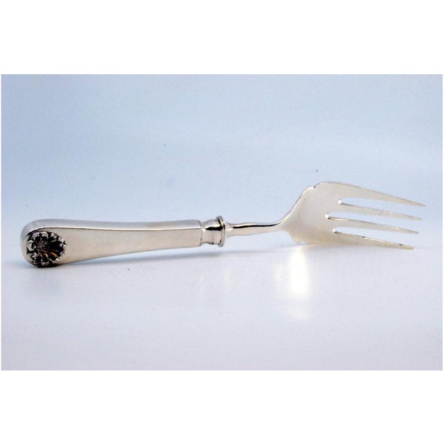 Plain Silver Fish Serving Fork with Shells, in Very Good conditions. Designed 1920 to 1949 This piece has an attribution...