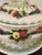 A charming vintage Japanese majolica-style soup tureen featuring richly detailed applied fruit garlands, leafy handles,...