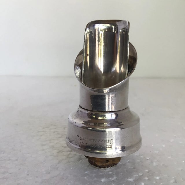 Here is a set of 5 made in Sweden Liquer or wine pour spouts.