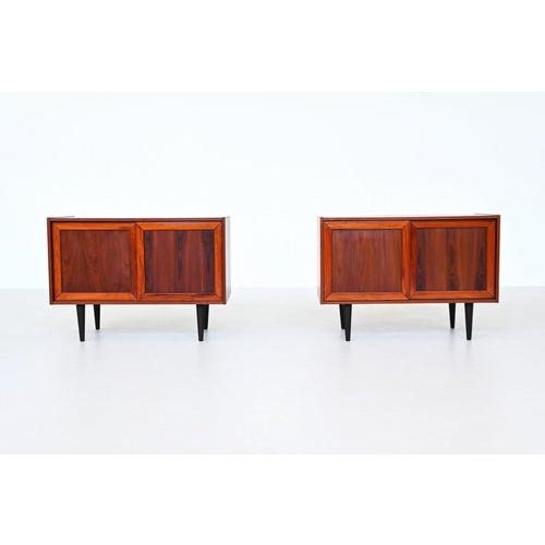 Beautiful pair of cabinets designed by renowned Danish designer Ib Kofod-Larsen and produced by Faarup Møbelfabrik,...