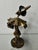 Bronze sculpture with golden patina of a clown with his briefcase. The contemporary French artist Yves Lohe is known for...