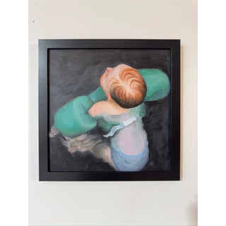 Adrift In The Tide by Fikriye Oz | Oil On Wood Painting of a baby in a green flotation device. For Sale