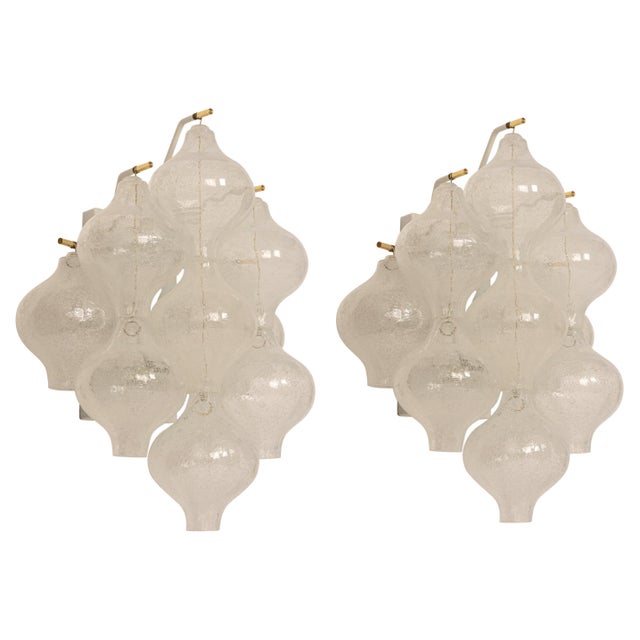 Wonderful pair of mid-century wall sconces, made by kalmar, austria, manufactured, circa 1970-1979. each tulip-shaped...