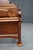 Traditional cherry wood queen-size bed by Dutch Designs, featuring a shaped Federal-inspired headboard with decorative...