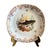 A refined and poetic Limoges porcelain fish service, delicately adorned with hand-painted freshwater fish, each plate...