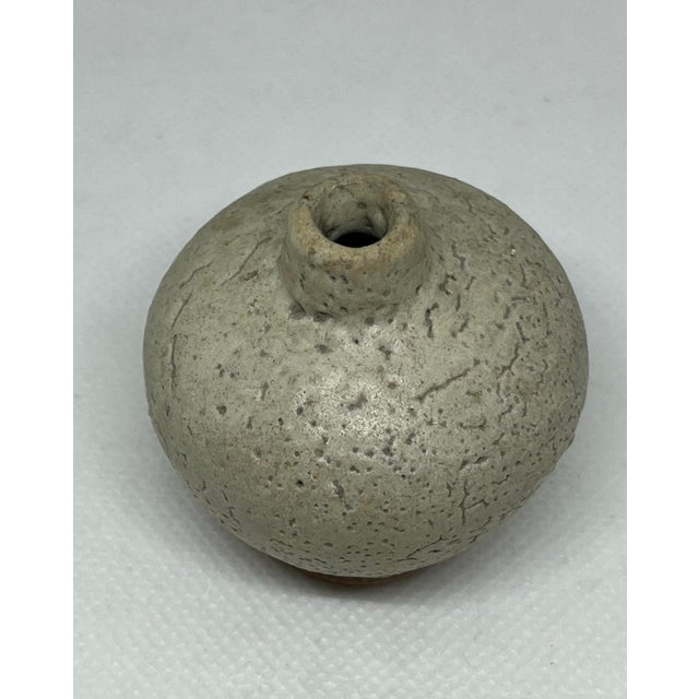 A original antique Chinese Stoneware with white glaze (Cizhou ware) jar let from the Song Dynasty (960-1279) Measuring...