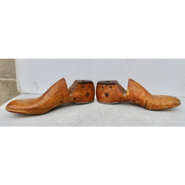 Stamped U S NAVY 1938 and 1932. A matched pair of 9E by Vulcan. Formed of hardwood and with steel sold plates. The...