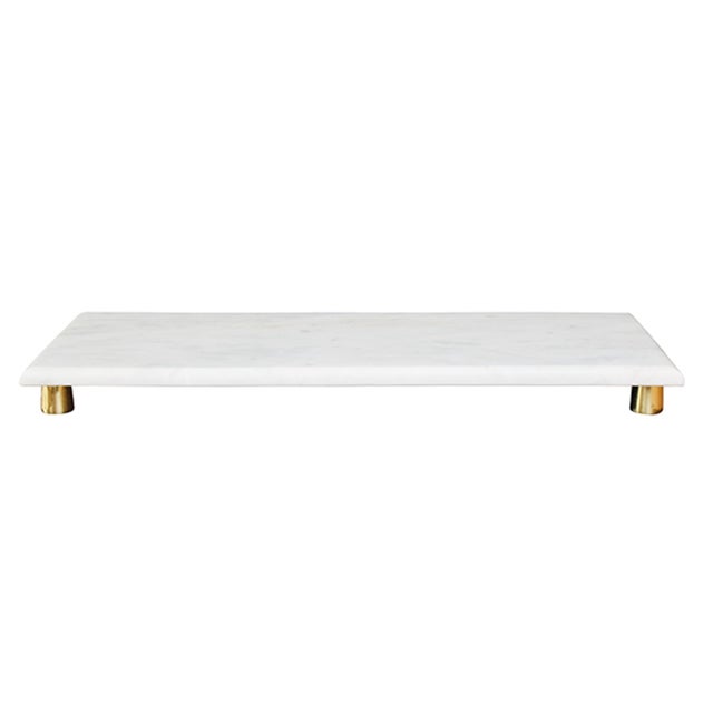 Add a touch of elegance to your home decor with the Beck White Marble Tray. The brass feet add a stylish contrast while...
