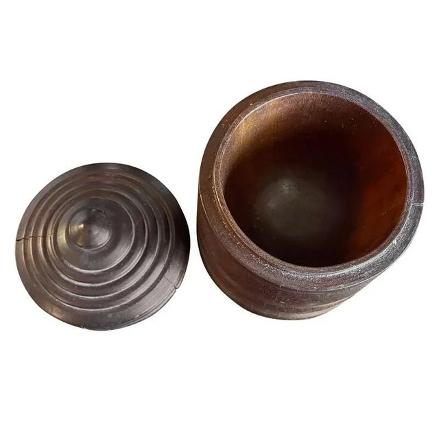 A stylish American wooden tobacco container with great patina perfect for tobacco, spice, or salt storage. Turned circular...