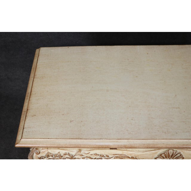This elegant Louis XV style painted console table or writing desk is a refined interpretation of one of France's most...