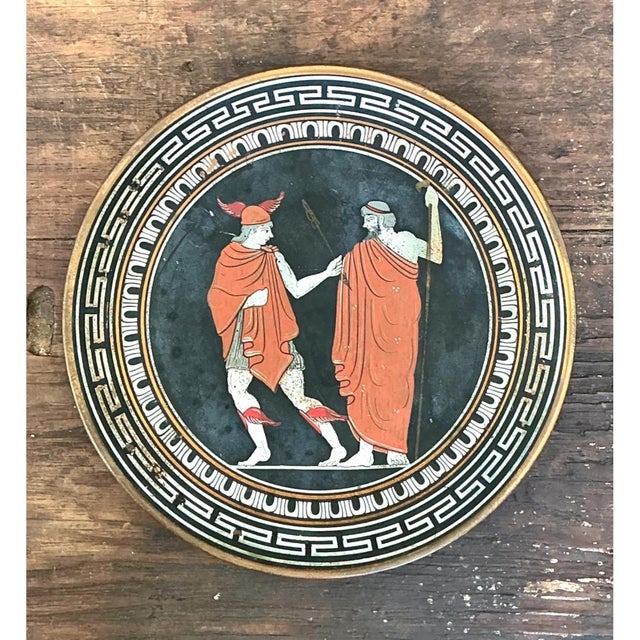 This vintage Greek mythology metal plate is a beautifully executed decorative object, its circular form serving as a...