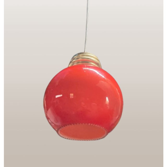 Red Opal Glass Pendant Globe, 1970s, in Flawless conditions. Designed 1970 to 1979 Up to 250V (Europe/UK Standard).The...