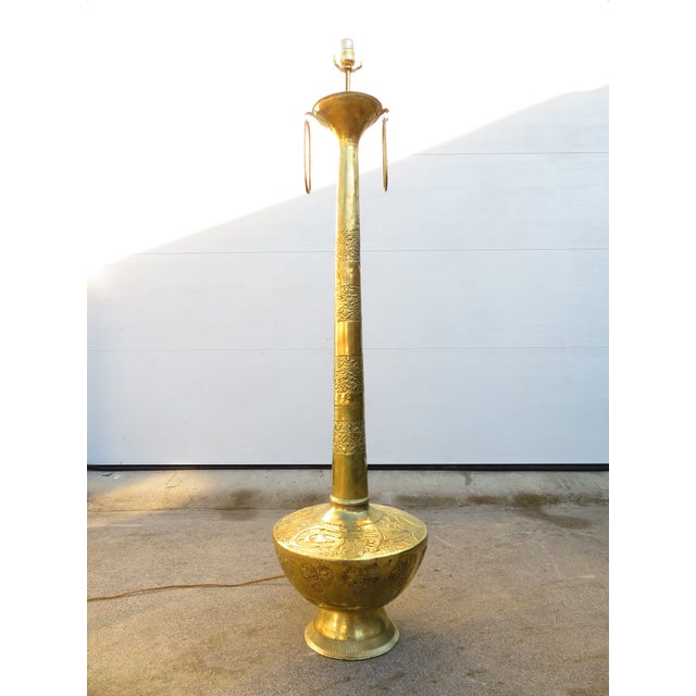 A dramatic and sculptural vintage hammered brass pedestal lamp with unmistakable Ottoman revival influence. Originally...
