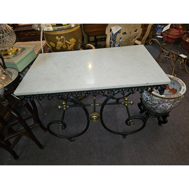 Beautiful 19th Century French Patisserie of Boucherie Table Topped by a ¾ inch thick white marble with subtle gray...