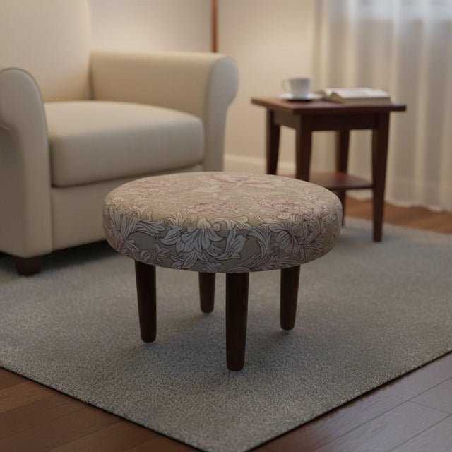 A round Danish stool that really becomes like a soft splash of color in your home, almost like a little chocolate that...