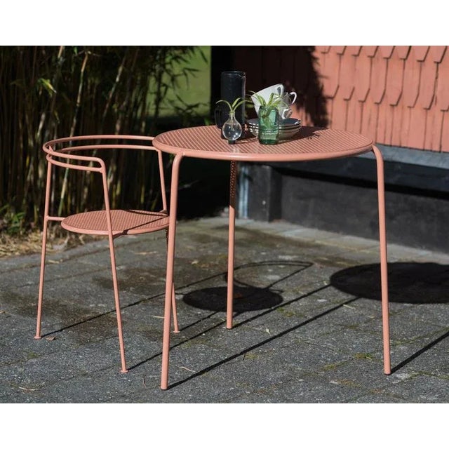 Dusty peach point table by ok design dimensions: d 79 x w 76.5 x h 73 cm. Materials: powder-coated metal. The point table...