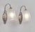 M. Hudry & Muller frères A beautiful pair of 1925-1930 French art deco wall sconces in nickel plated solid brass or bronze...