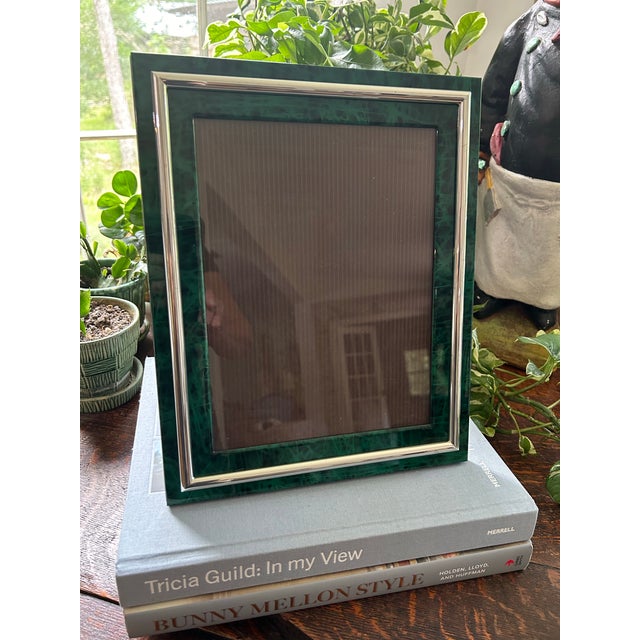 This classic faux malachite picture frame has a contemporary European feel, but will add a pop of color to any decor. Made...