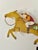 A beautifully made A La Maison horse balance toy from 2006, featuring a hand painted racehorse and jockey on a slender...
