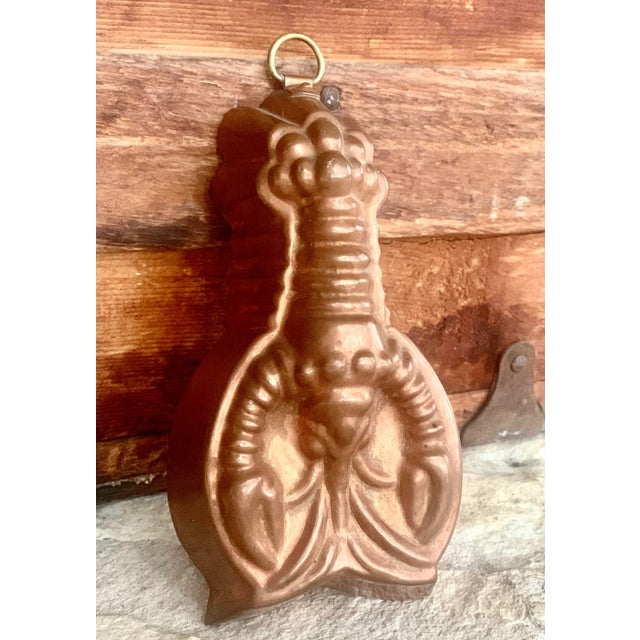 Vintage 1980’s copper lobster kitchen mold. The highly detailed copper over tin mold has a rich, aged patina and a brass...