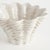 With an antique subtle crackle glaze, this generously scaled shell vase is a stunning accent. Whether on a side table,...