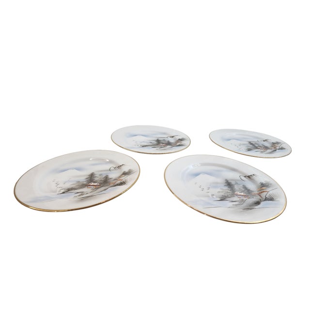 A winter hush in porcelain. This exquisite vintage Kutani plate captures a serene Japanese landscape beneath the snow-...