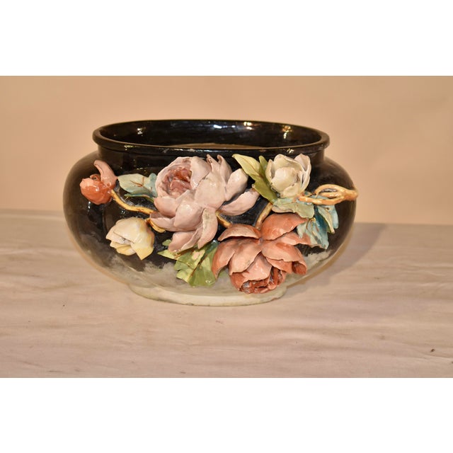 19th century French majolica jardiniere. This jardiniere is very interesting. It has a black and gray glazing on the...