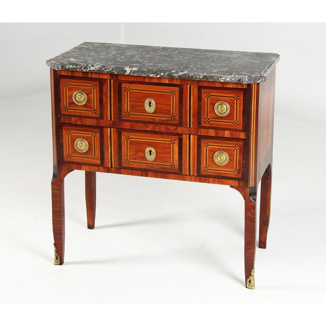 Small chest of drawers with marble top france rosewood and others transition around 1780 dimensions: h x w x d: 77 x 78 x...