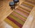 4’ 1” x 12’ Beautiful and colorful Turkish hand woven kilim wide runner from the mid 1900s. It has wonderful bright colors...
