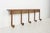 Industrial style wall hook rail with five peg hooks. It is made of wrought iron with a distressed rusted finish. It has a...