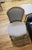 This Kravet dining chair features a refined Italian-inspired design with a sculpted solid wood frame and gracefully curved...